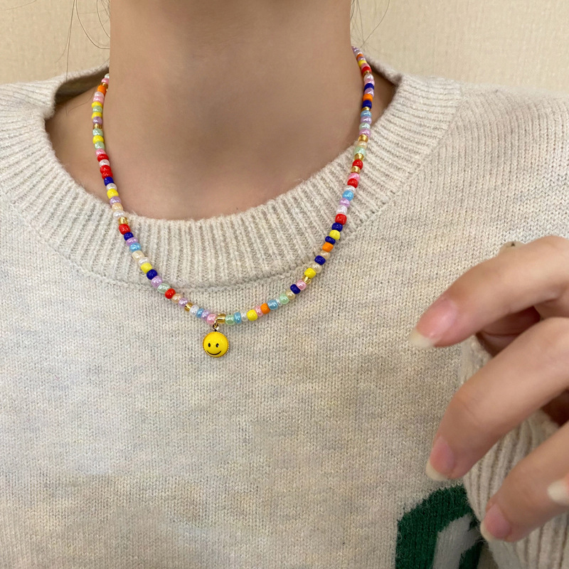 The 2023 new style of colorful beaded smiley face necklace for women, a niche collarbone chain design, and a hot girl hoodie accessory details Picture