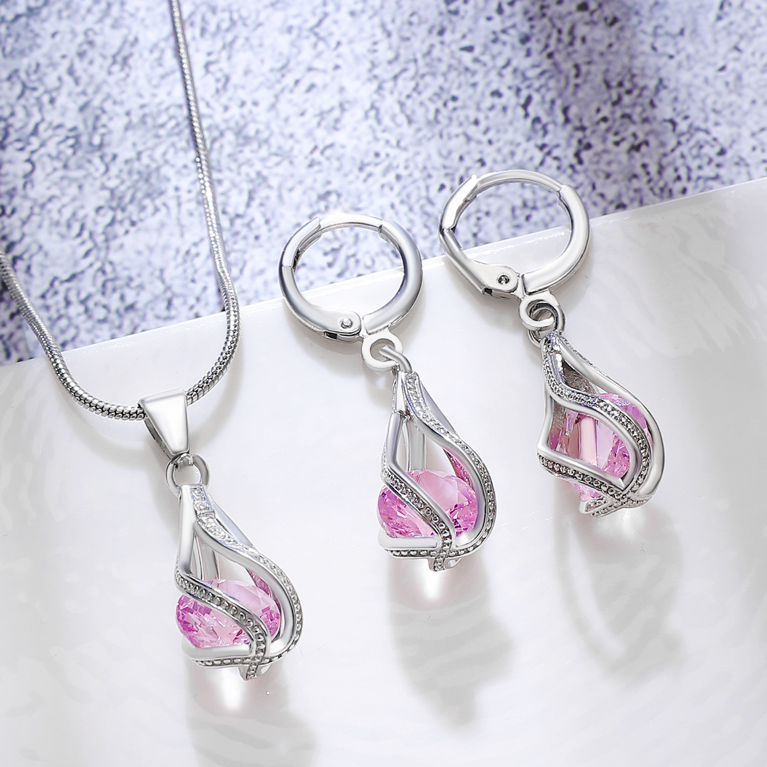 Cross-border best-selling zircon crystal jewelry set for women, European and American retro creative design rotating water drop necklace earrings, trendy Application Scenario