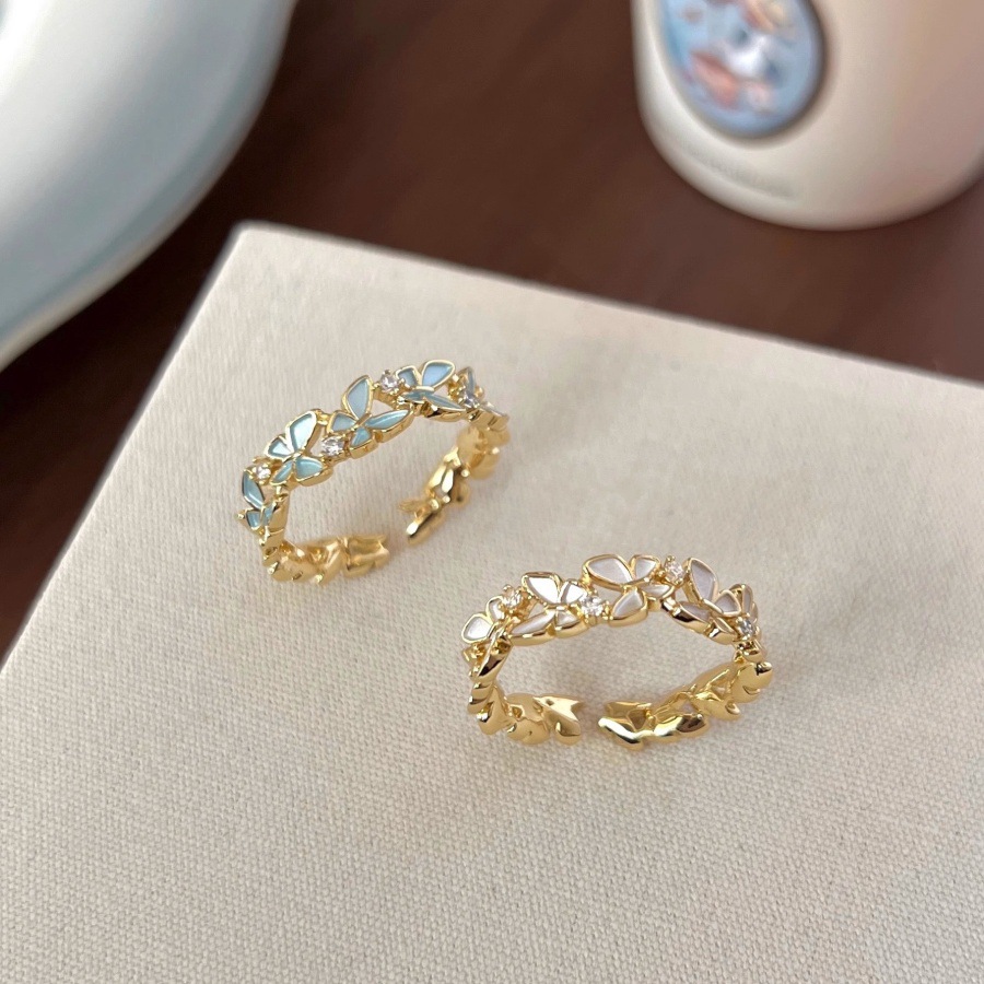 The new zircon drip glaze flower butterfly ring is a unique and light luxury index finger ring for women. It exudes a sense of sophistication and is a versatile ring trend Specification drawing