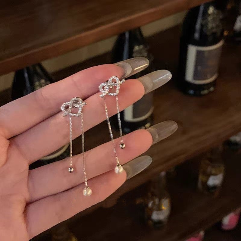 "Elf Swaying zirconium heart-shaped back-hanging pearl tassel earrings, high-end and elegant female earrings and stud earrings wholesale. full figure