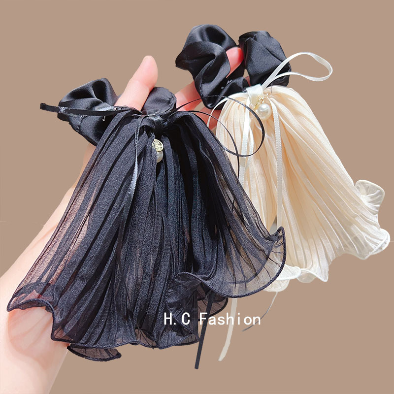 The super ethereal pleated black fungus edge double-layer mesh ribbon bow hair tie is gentle and versatile, with a hair tie and hair accessory details Picture