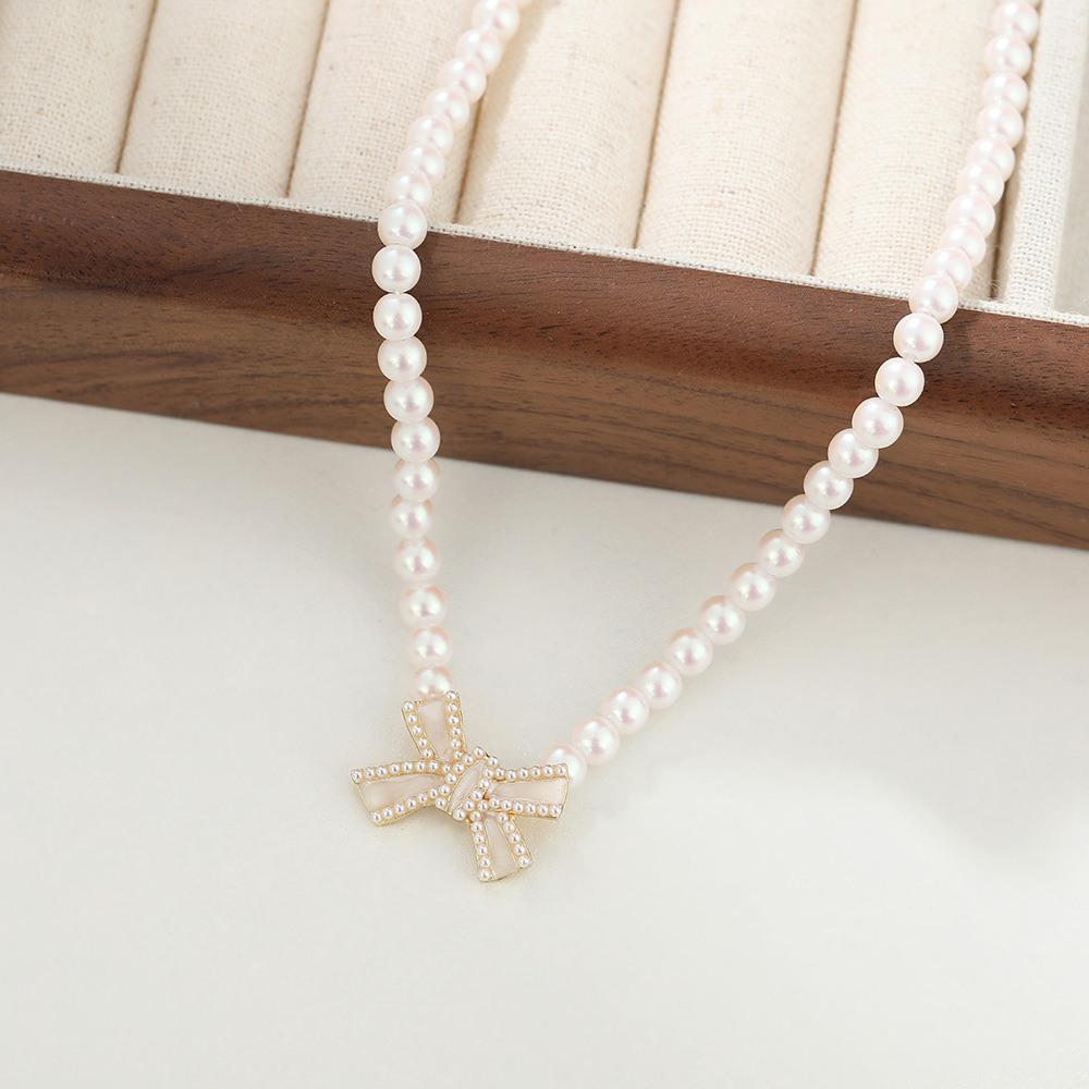 Customized new 2024 trendy pearl necklace, trendy and simple heart-shaped pendant, personalized and light luxury bow collarbone chain Specification drawing