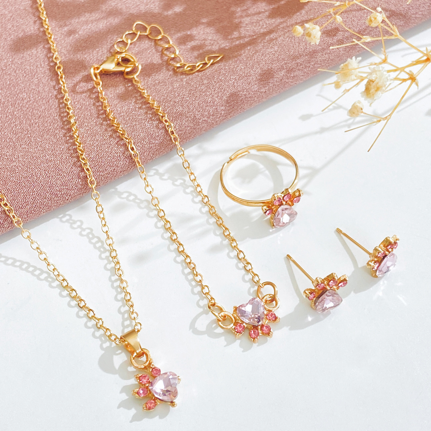 Korean fashion set, cute cartoon cat paw necklace, stud earrings, four-piece set, cat footprint zircon ring, bracelet for women Application Scenario