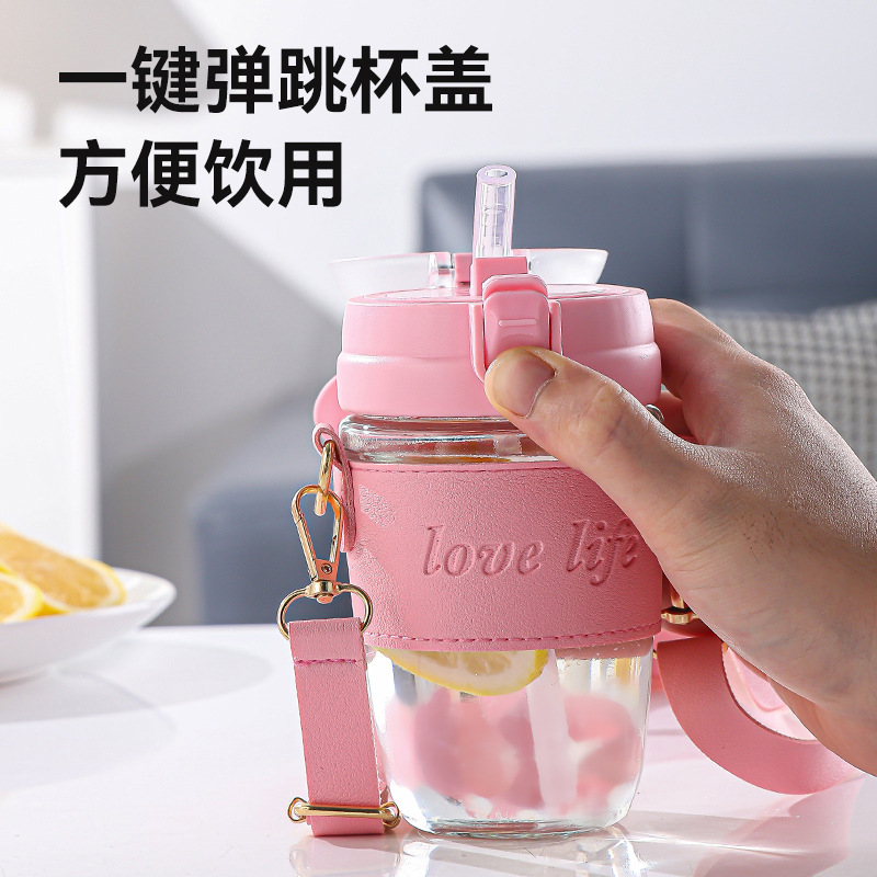 The cute rabbit glass water cup is adorable and girlish, with a high level of appearance. It is a heat-resistant straw cup that students can carry diagonally. It is a popular online cup Application Scenario