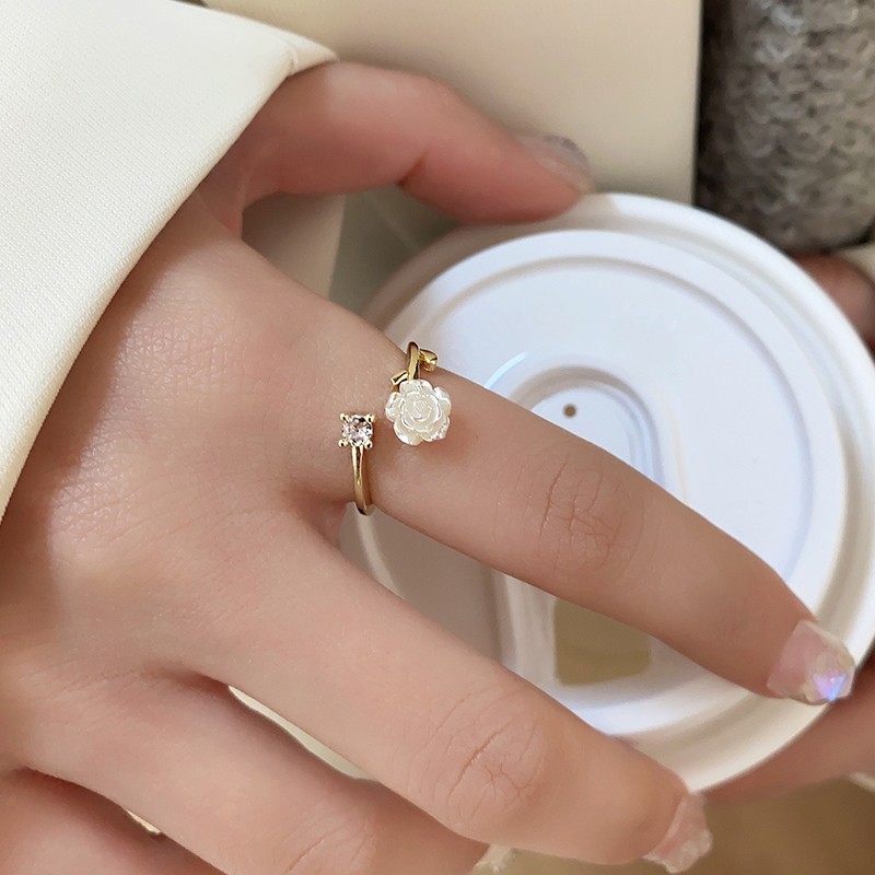 Camellia open ring, sweet and cool female style, niche design, fashionable and individual, light luxury, high-end zircon index finger ring details Picture