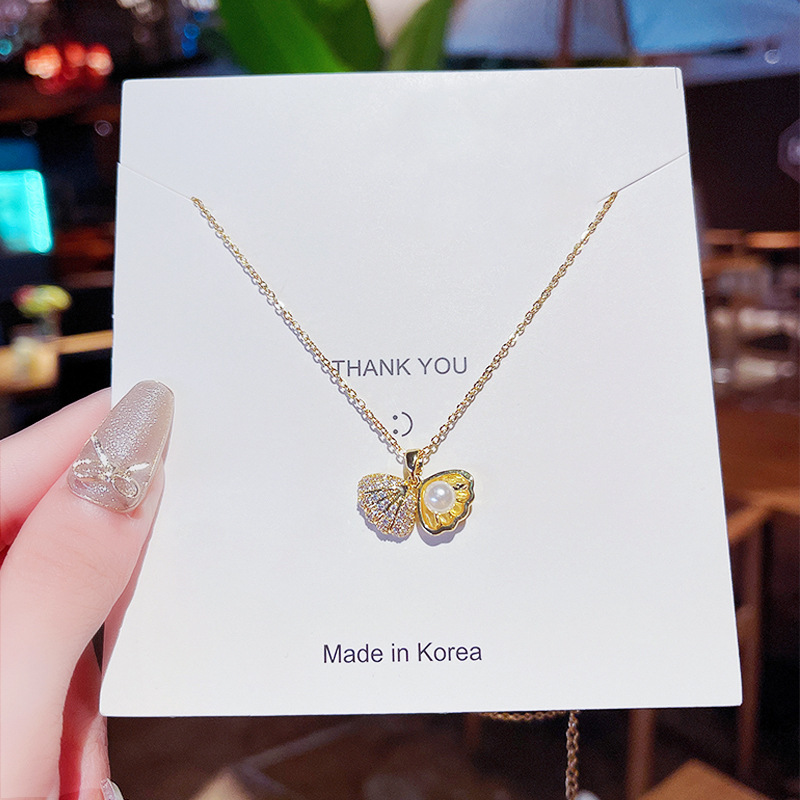 Light luxury and niche style pearl shell necklace, women's micro-inlaid zircon short collarbone chain, elegant night market small accessories wholesale details Picture