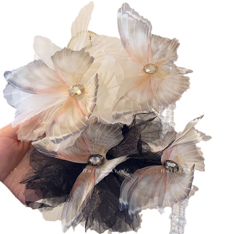 New fashionable, sweet and elegant, versatile butterfly crystal tassel gripper, high-end back head updo shark clip Item Picture
