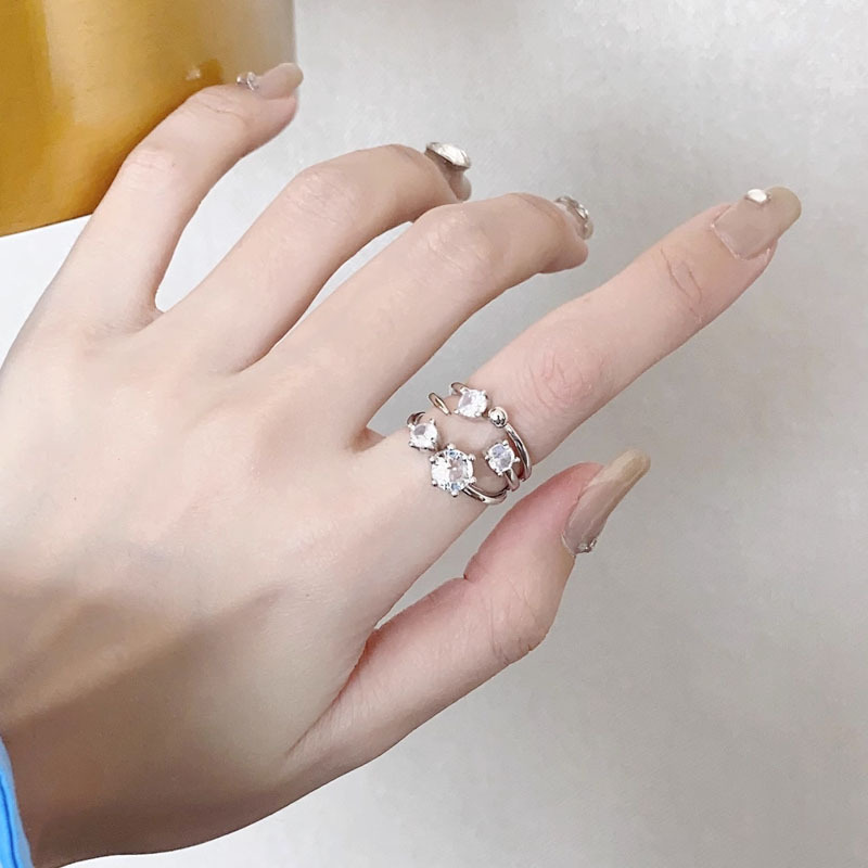 This is a unique French light luxury zircon fashion and personality ring designed for women. It has a cold and elegant style and a high-end feel. It's an index ring full figure