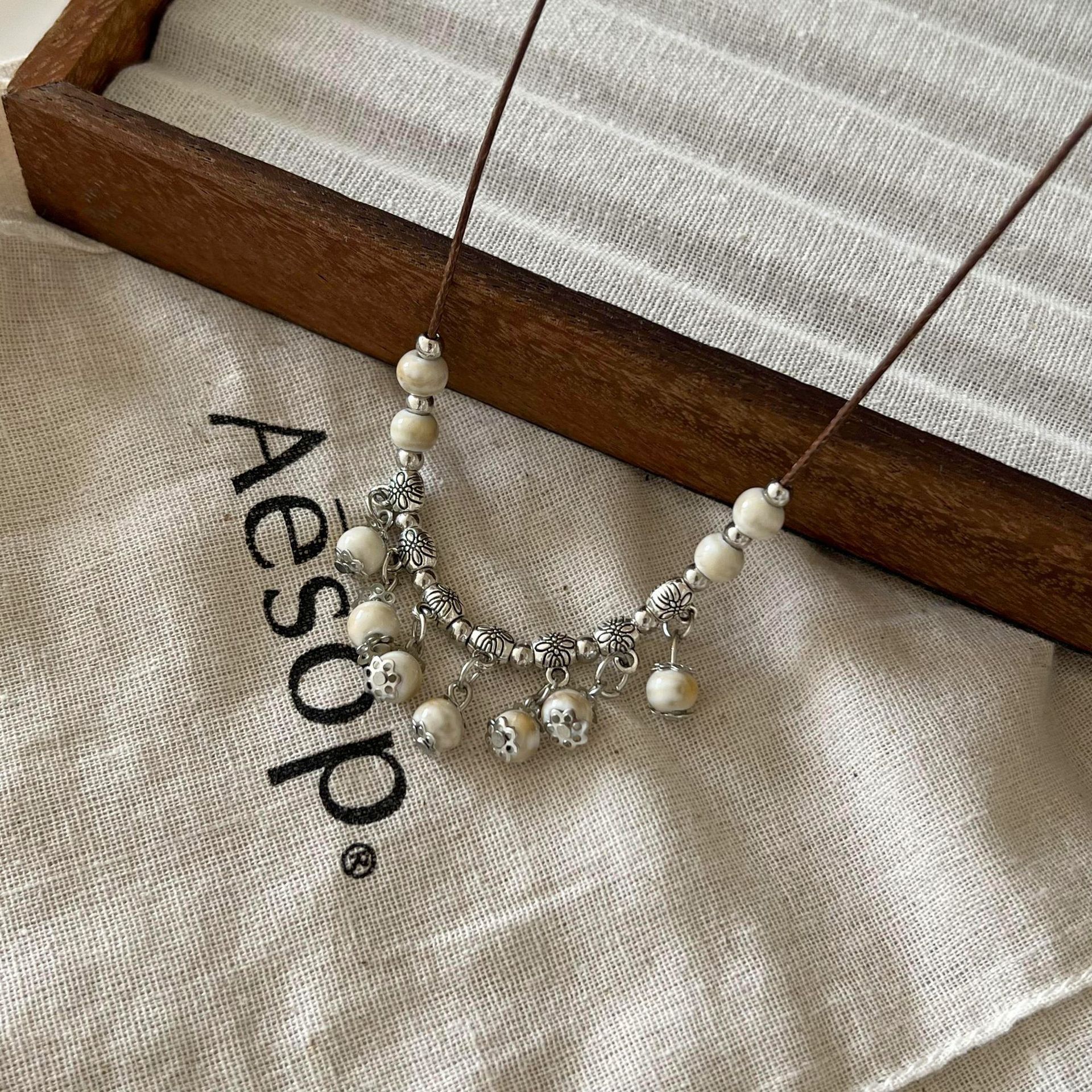 New Chinese-style fresh and light long round bead tassel necklace, retro ethnic style, light luxury, fashionable and elegant sweater chain for women full figure
