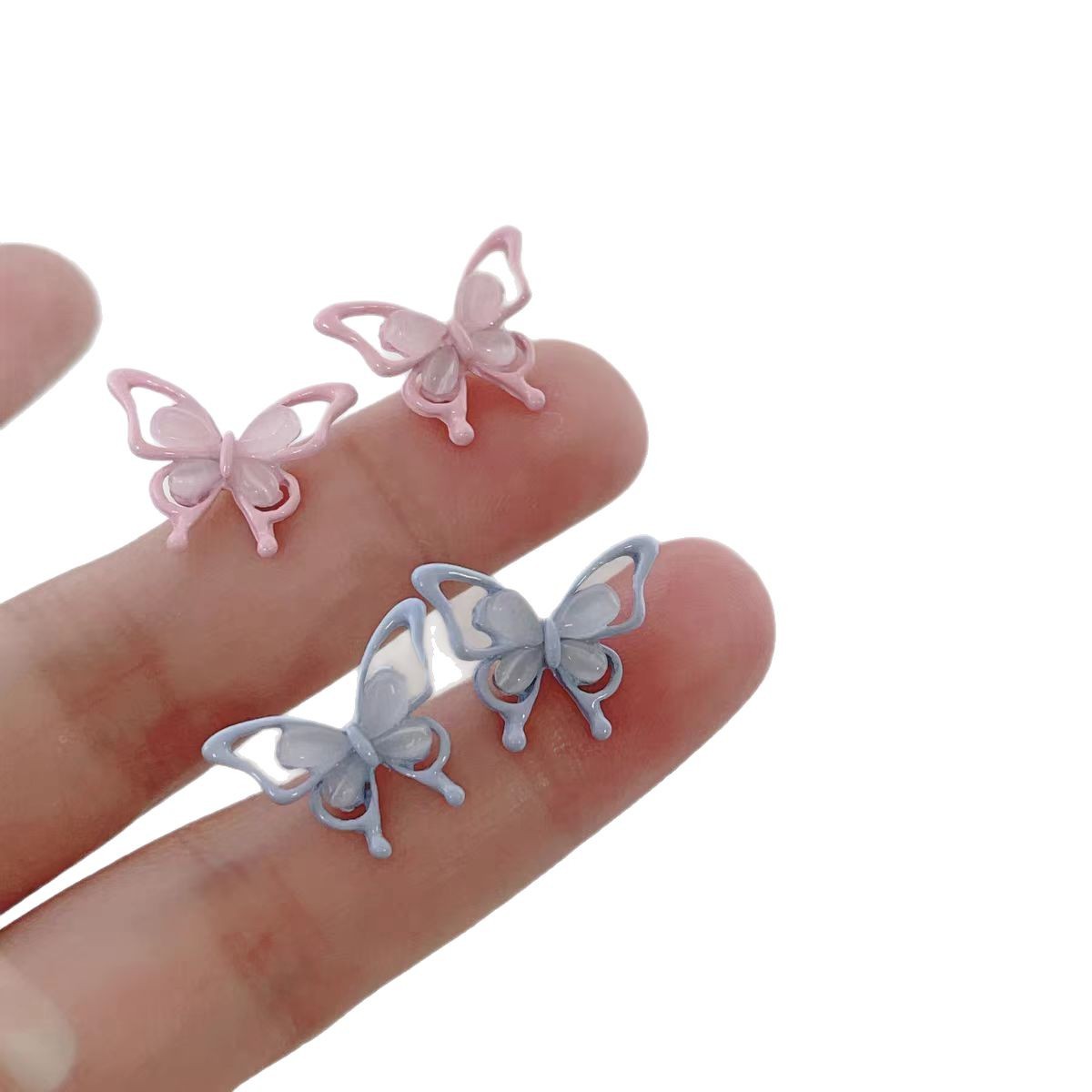 Spring new cat's eye stone powder blue small butterfly stud earrings, women's silver needle, super fairy-like, versatile and sweet three-dimensional earrings for daily use Item Picture