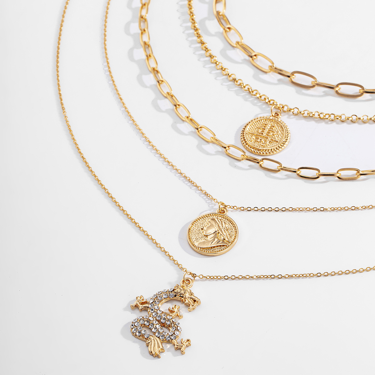 This is a stylish and elegant cross-border accessory from Europe and America. It features a diamond-encruffled dragon-shaped necklace that is unique and fashionable for women. It also includes a longevity character portrait round pendant necklace Application Scenario