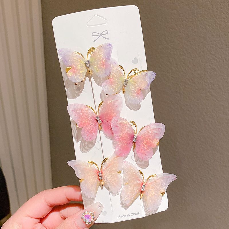 New super fairy gradient butterfly children's hair clips, ancient costume style girls' hair clips, ponytail clips, hair accessories, headwear clips wholesale Application Scenario