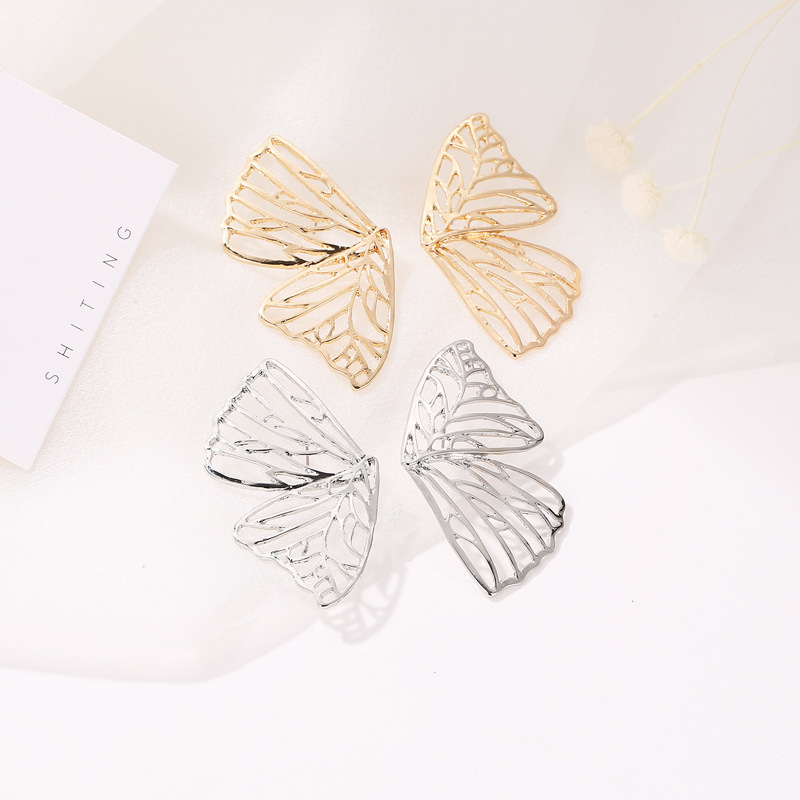 Wish AliExpress is selling exaggerated hollowed-out butterfly wing stud earrings and Middle Eastern trend fan-shaped creative earrings wholesale details Picture