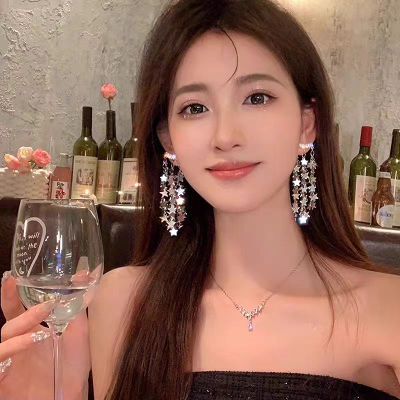 The 2025 new trendy sequined five-pointed star earrings for women, long tassels, elegant and light luxury, super fairy-like, internet-famous stud earrings full figure