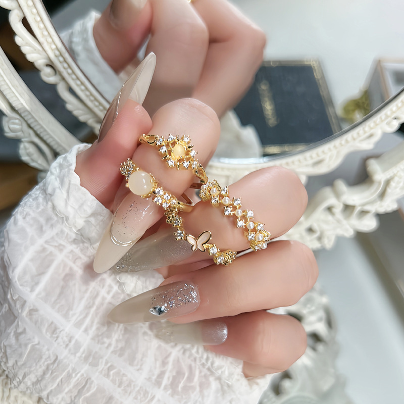 Korean-style niche design micro-inlaid hollowed-out butterfly elegant open ring for women on Instagram, cold style, sweet and cool personality ring Application Scenario