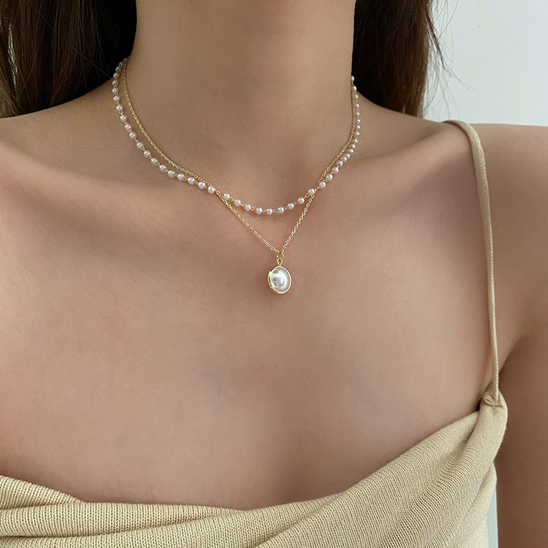Double-layer pearl necklace with a unique design sense for women, a trendy 2023 new style that doesn't fade, a Korean style collarbone chain full figure