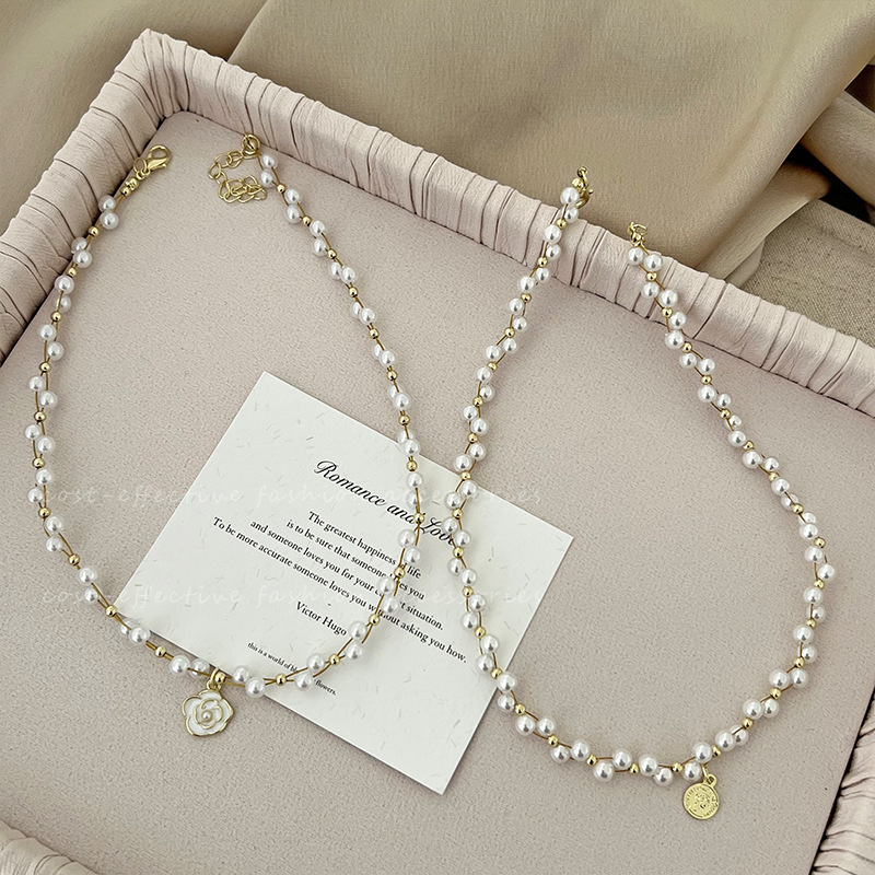 Light luxury camellia pearl necklace with a niche design sense for women, new summer 2024 collarbone chain accessory wholesale Application Scenario