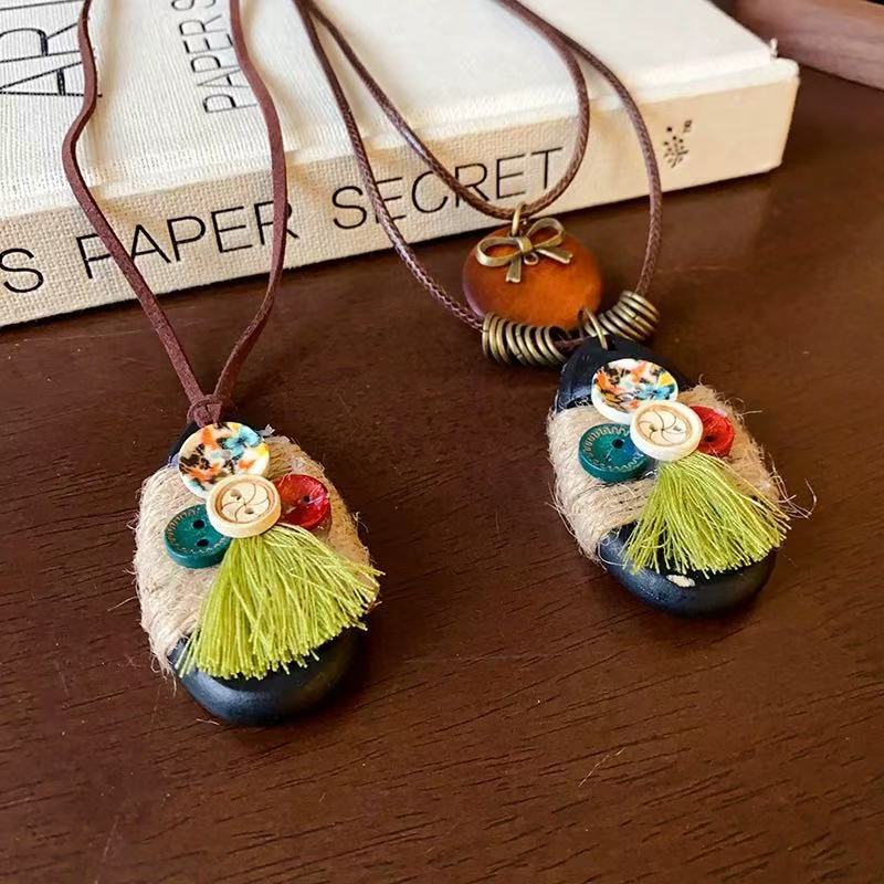 Bohemian-style retro button water drop pendant necklace for women, 2024 new ethnic style long sweater chain necklace Application Scenario