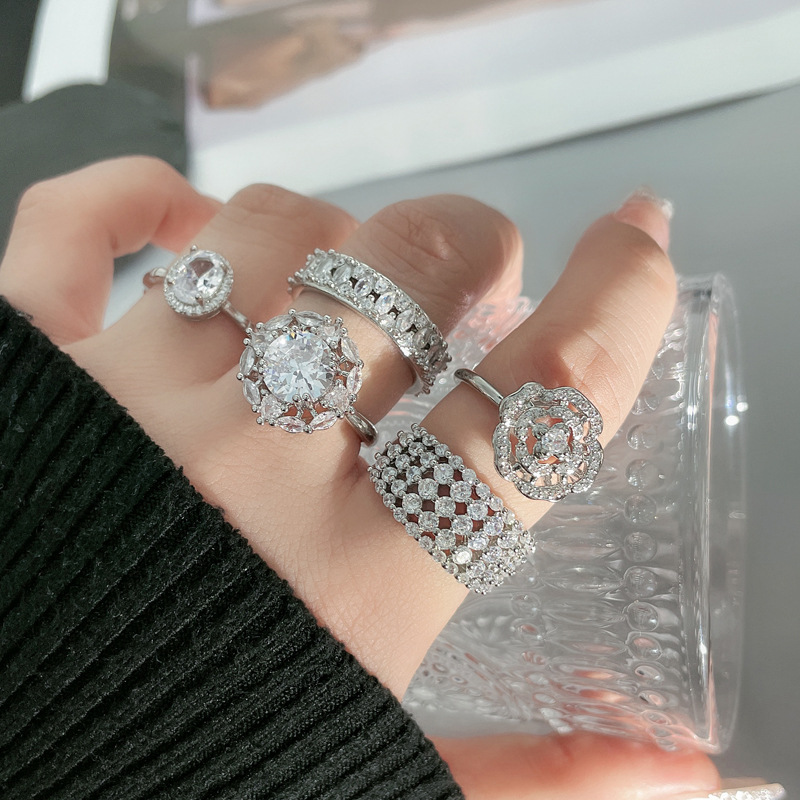A light luxury and high-end full-diamond zircon flower open ring for women, exquisite and versatile, sweet and cool geometric style ring full figure