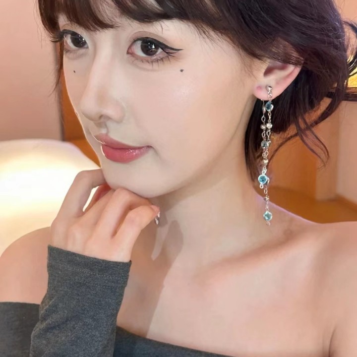 Spring and summer dual-wear Glacier blue crystal tassel stud earrings, long forest-themed, light luxury and versatile design earrings Application Scenario