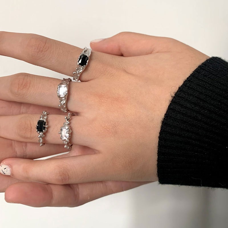 A Korean-style niche design transparent zircon ring with a cold texture for women, irregular and fashionable with an adjustable opening details Picture