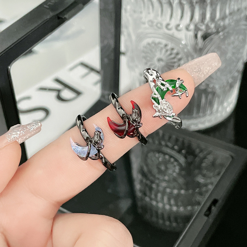 A niche design moon rose entwined dark and individualistic open ring, a unique and fashionable feminine androgynous ring for a hot girl full figure