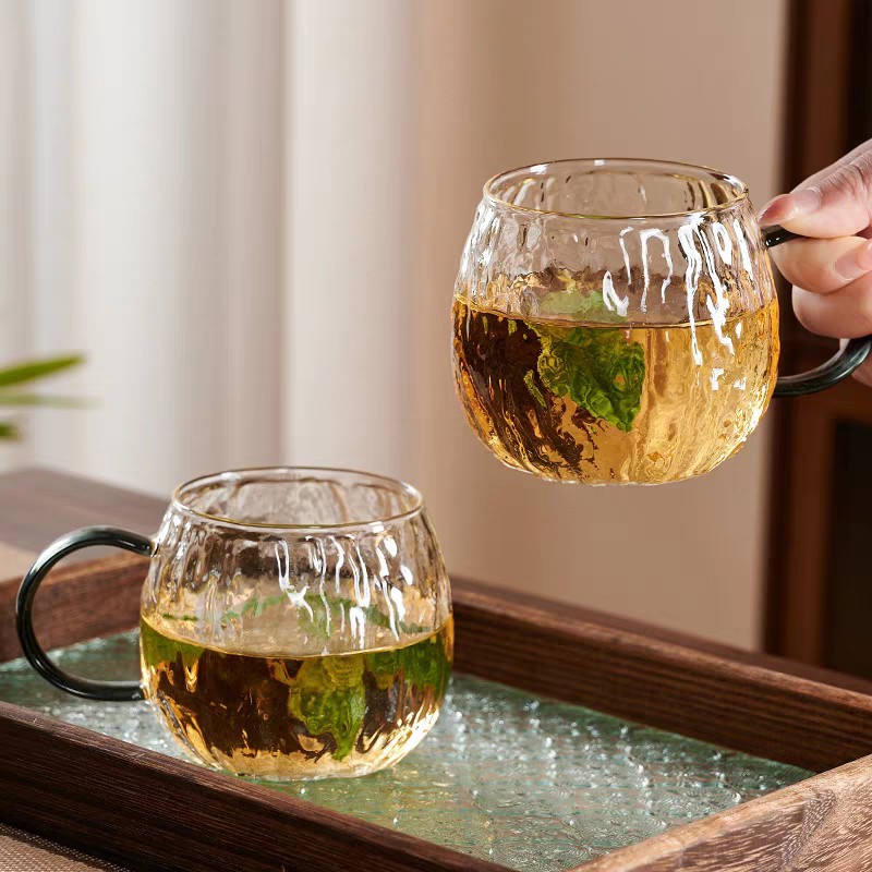 Cross-border glass cups, heat-resistant high borosilicate glass, hammer-textured beverage and drinking cups, household single cups with handles, round and fun glass details Picture