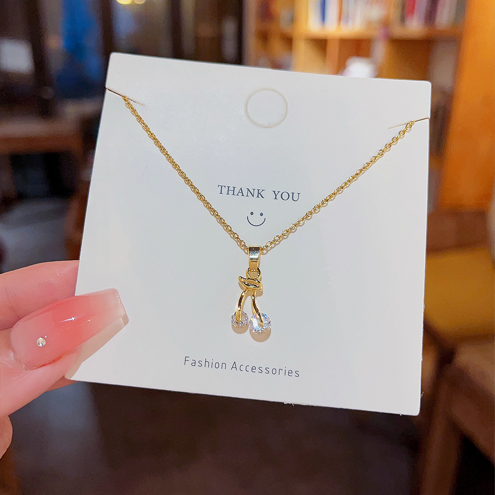 Japanese and Korean style small cherry micro-inlay zircon titanium steel necklace, feminine and individual collarbone chain, simple and niche accessory necklace details Picture