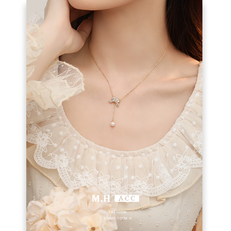 A light luxury bow zircon pearl necklace with a high-end female feel, a new Korean-style golden collarbone chain, a fashionable commuting accessory full figure