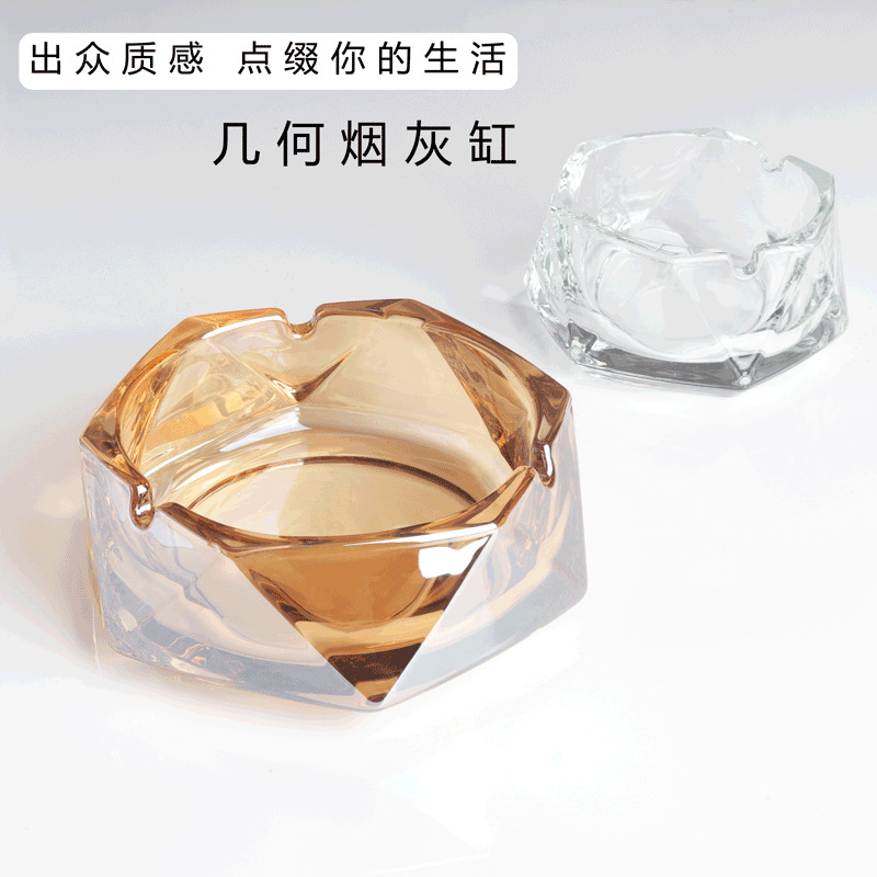 A simple glass ashtray with a creative design and a high level of appearance. It is a high-end and light luxury decoration for home use in the living room and a commercial ashtray details Picture