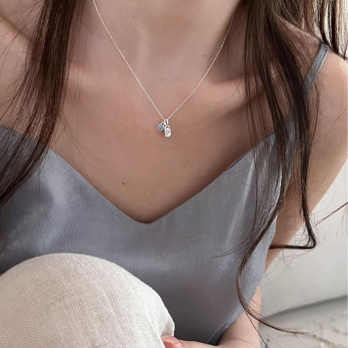 Simple, niche, irregularly textioned square pendant, blue zircon heart-shaped necklace, versatile collarbone chain for women full figure