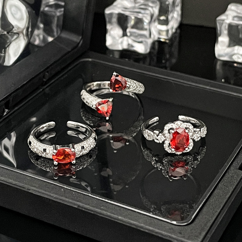 A high-end red zircon open ring with a touch of European and American style, a delicate oval-shaped design for women, sweet and cool, light luxury fashion, and a trend of wearing multiple rings Application Scenario