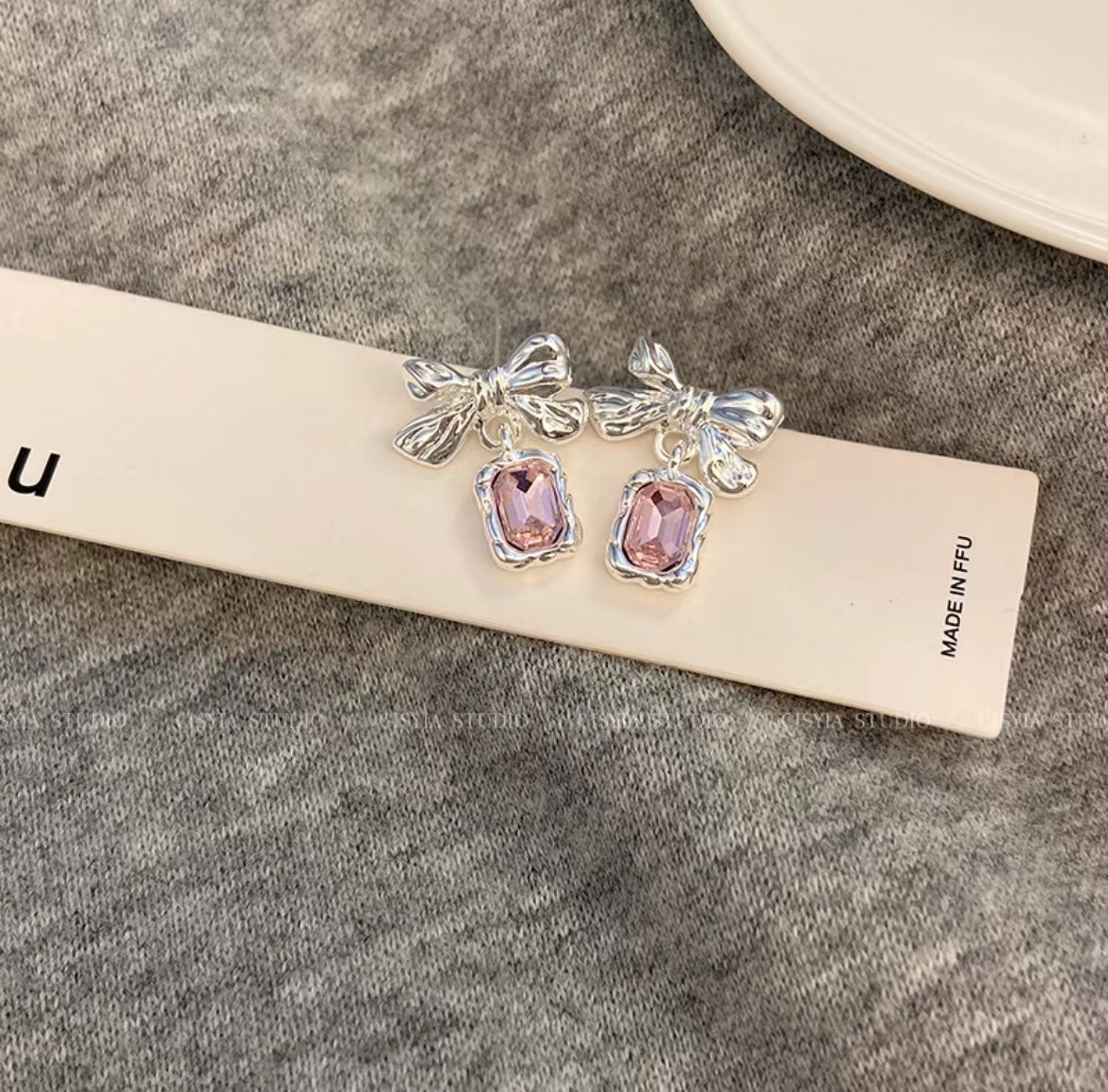 New trendy Japanese and Korean metallic square diamond bow stud earrings with a niche design for women, featuring a cold and fashionable light luxury style details Picture
