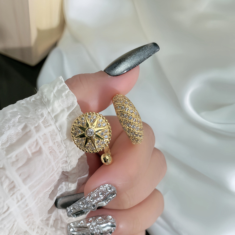 The new retro internet-famous compass star-studded open ring exudes a touch of luxury and sophistication for women. It is an exquisite and versatile ring that can be worn in layers full figure