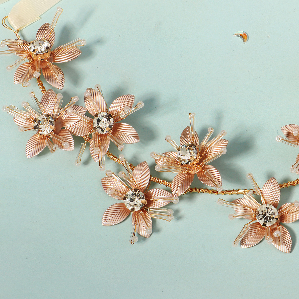 Cross-border new handcrafted metal flower hair band, women's Bohemian exotic style headwear, bride's updo and ribbon hair band Application Scenario