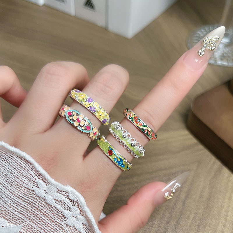Chinese-style enamel auspicious cloud elegant and high-end open ring, a women's ethnic style embossed flower light luxury and versatile ring Application Scenario