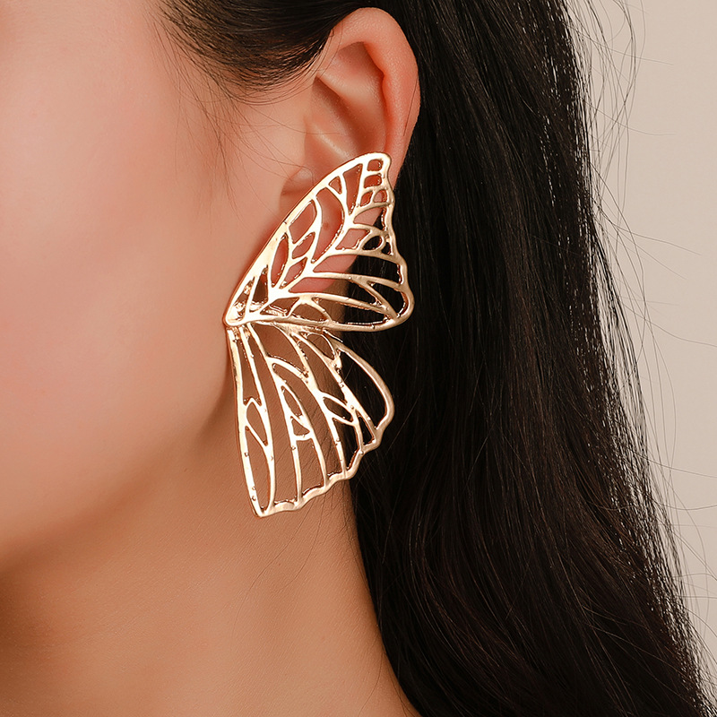 Wish AliExpress is selling exaggerated hollowed-out butterfly wing stud earrings and Middle Eastern trend fan-shaped creative earrings wholesale full figure