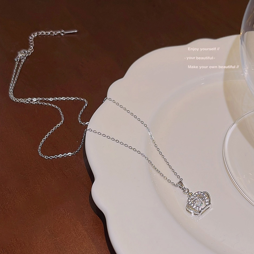 The new crown necklace with a light luxury and cold style for women, the sweater chain with a fashionable and high-end feel, the pendant with a versatile design, and the collarbone chain details Picture