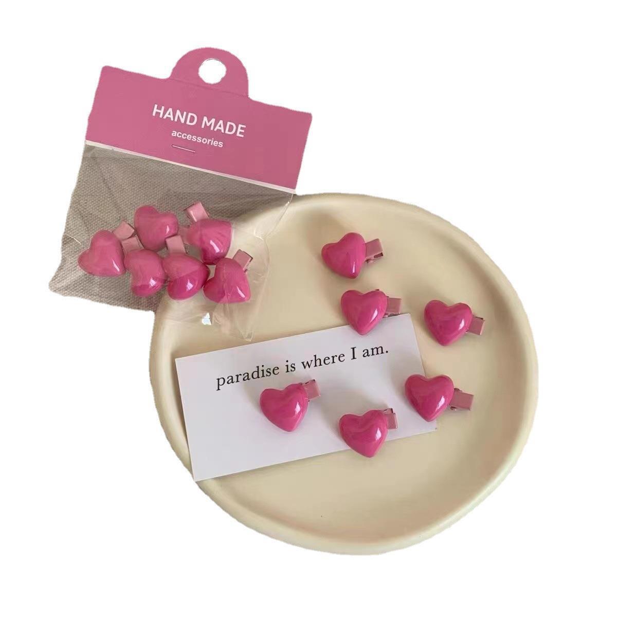 12 mini peach-colored heart-shaped hair clips for women, 2cm short clips, duckbill clips, sweet and cute pink broken hair clips Item Picture