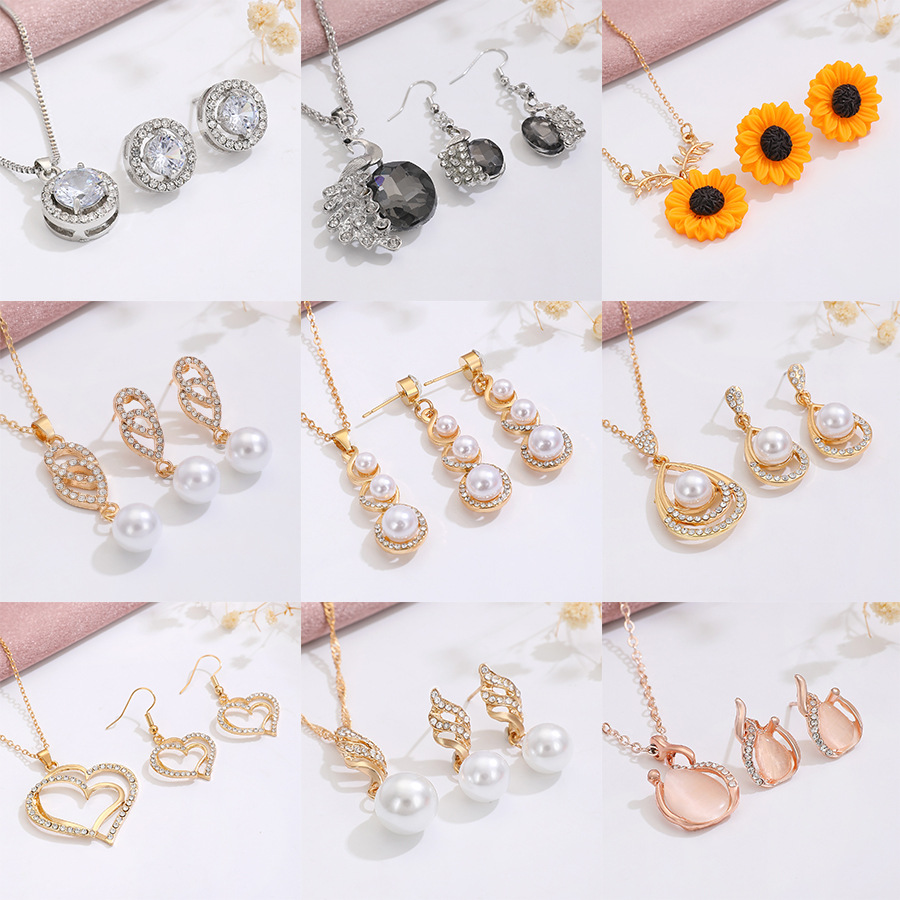 Cross-border best-selling diamond-encrusted pearl jewelry set, women's fashionable and elegant geometric flower water drop necklace and earring set details Picture