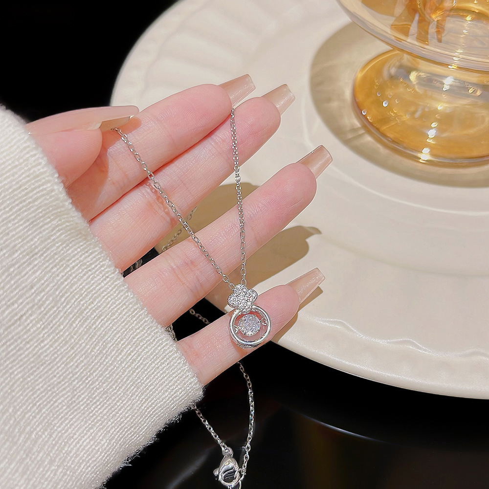 Titanium steel necklace with feminine charm, zircon geometric collarbone chain, dynamic pendant, Christmas gift and accessory new wholesale full figure