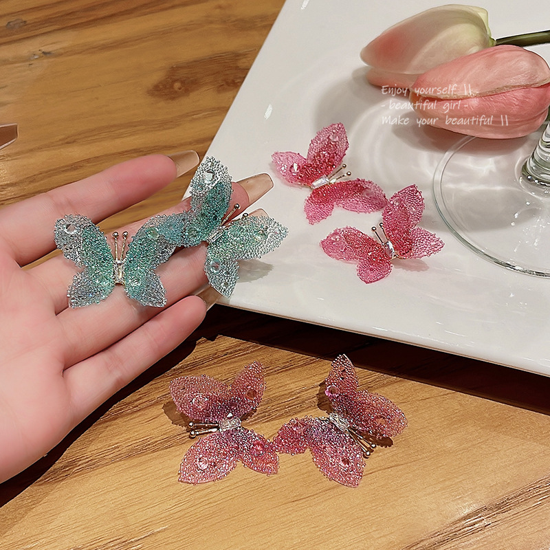 Sweet, fashionable, fresh and colorful butterfly earrings, women's light luxury, individual and high-end sense ear studs, popular and best-selling earrings full figure