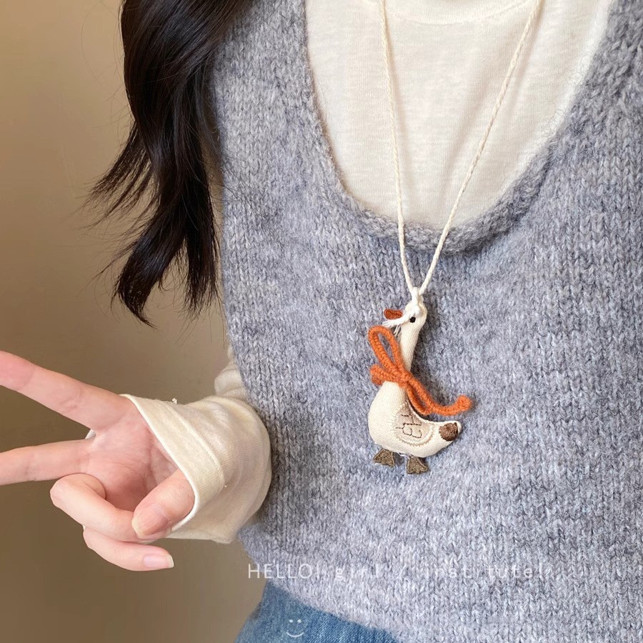 Cute autumn and winter plush toys, adorable pet figurines, girl cartoon animal backpack pendants, artistic and retro pendants details Picture