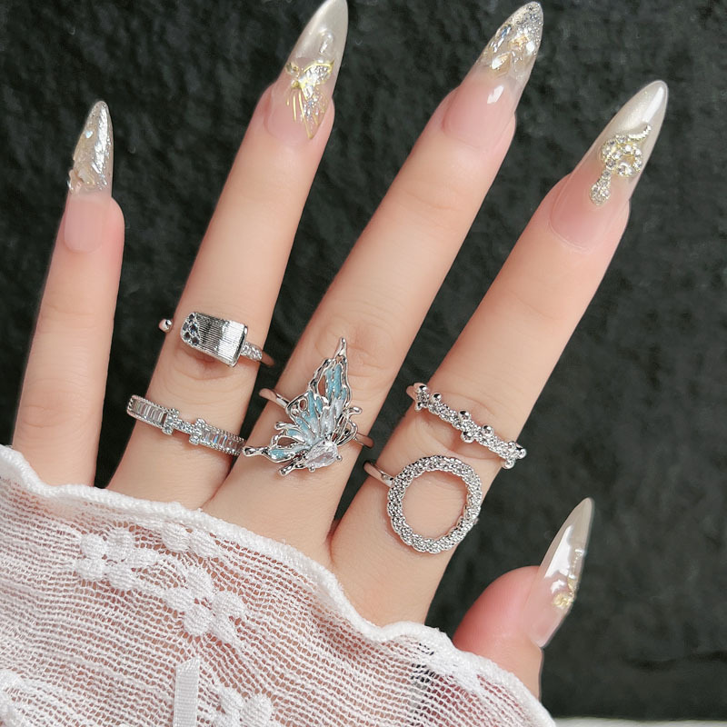 Minimalist Korean-style flapped butterfly irregular pleated texture open ring female letter full diamond fashionable niche ring details Picture
