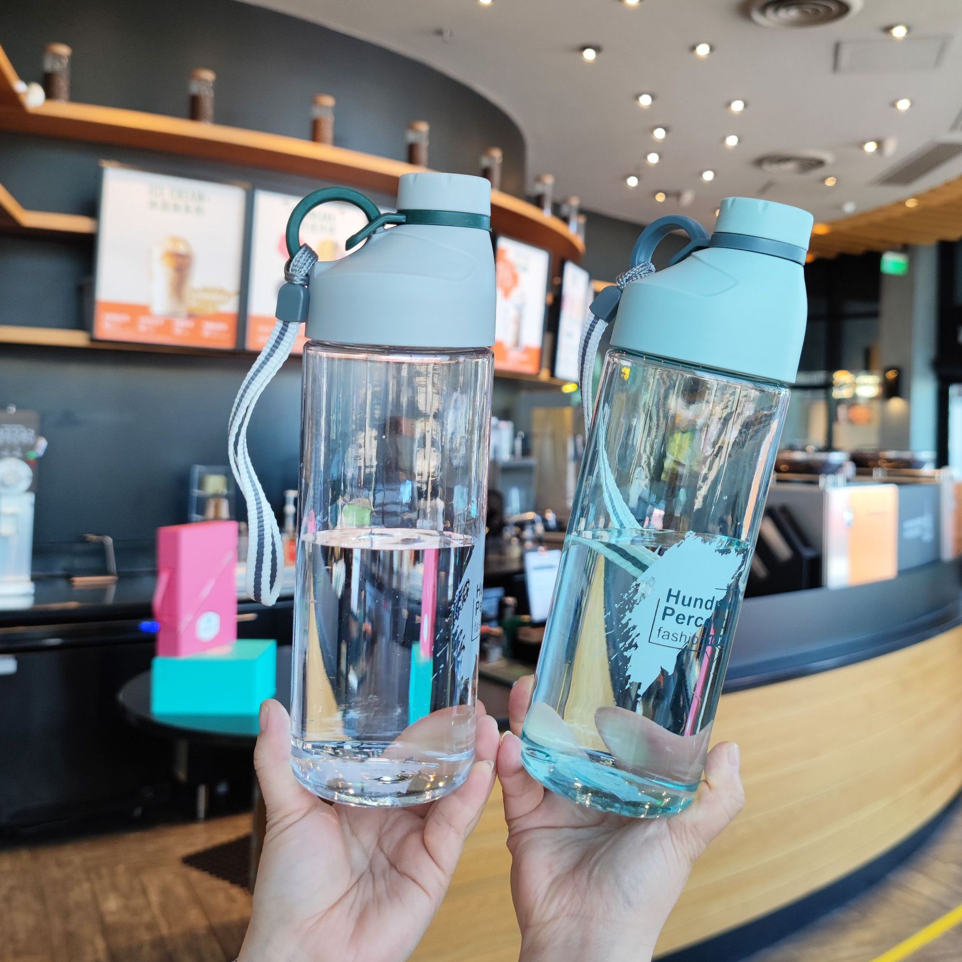 Summer fresh and convenient plastic space cup with a carrying rope, simple and direct drinking for adults, outdoor sports, backpack travel water cup Application Scenario