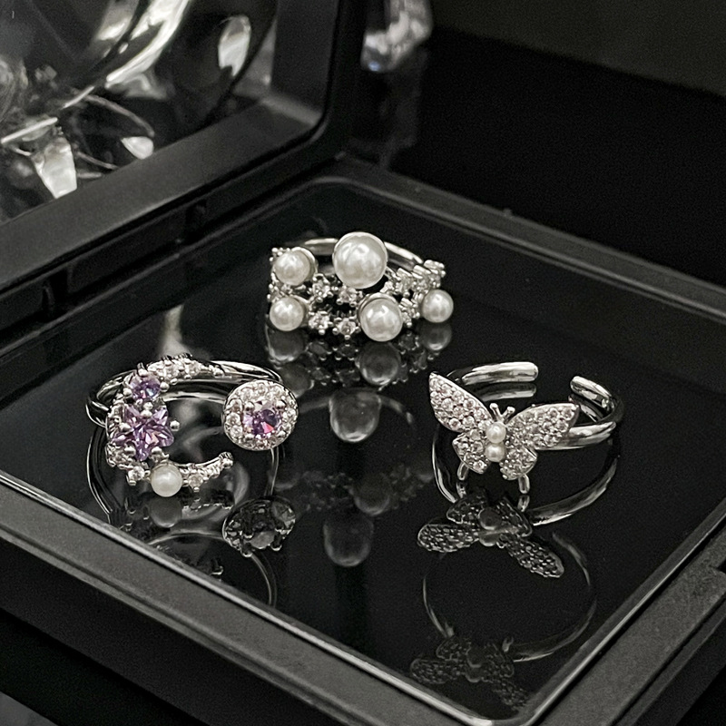 A new French pearl opening adjustable ring for women, with a unique and high-end look, is a butterfly ring in a cold style on Instagram Specification drawing