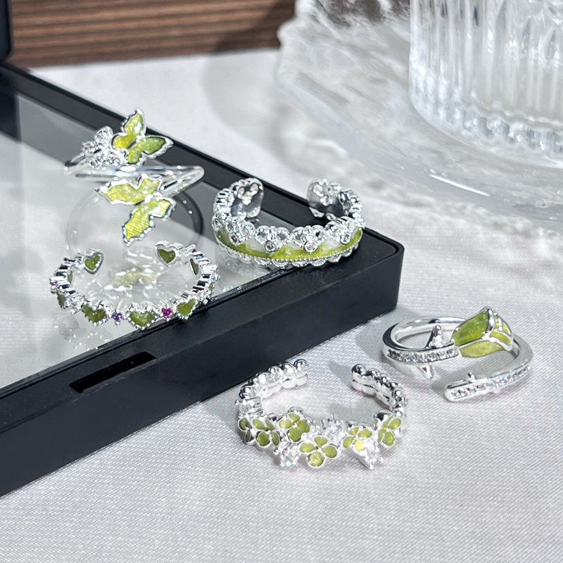 The "Flower Bloom" series features a fresh and delicate design with a light green, sweet and exquisite open ring, a butterfly flower ring for women Application Scenario