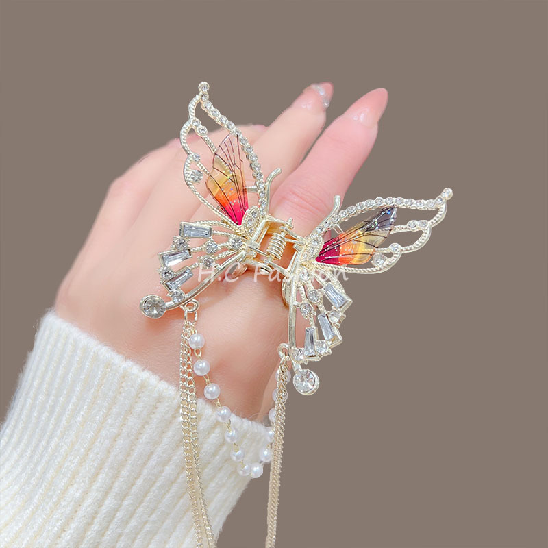 Super fairy butterfly wing pearl tassel grappling clip women's high-end semi-tied hair clip, new updo shark clip hair clip accessory Application Scenario