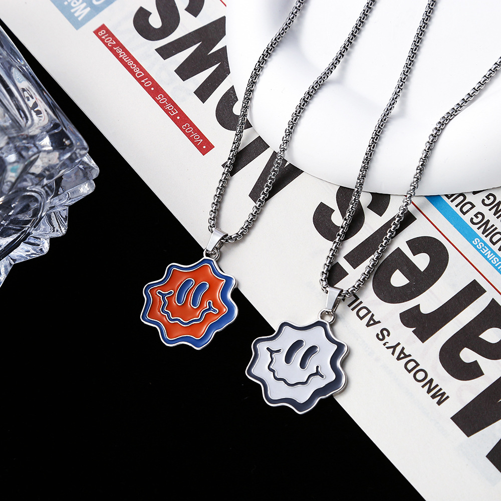 New smiling titanium steel necklace, a fashionable and trendy cartoon cute expression necklace, a hip-hop couple's personalized pendant accessory full figure