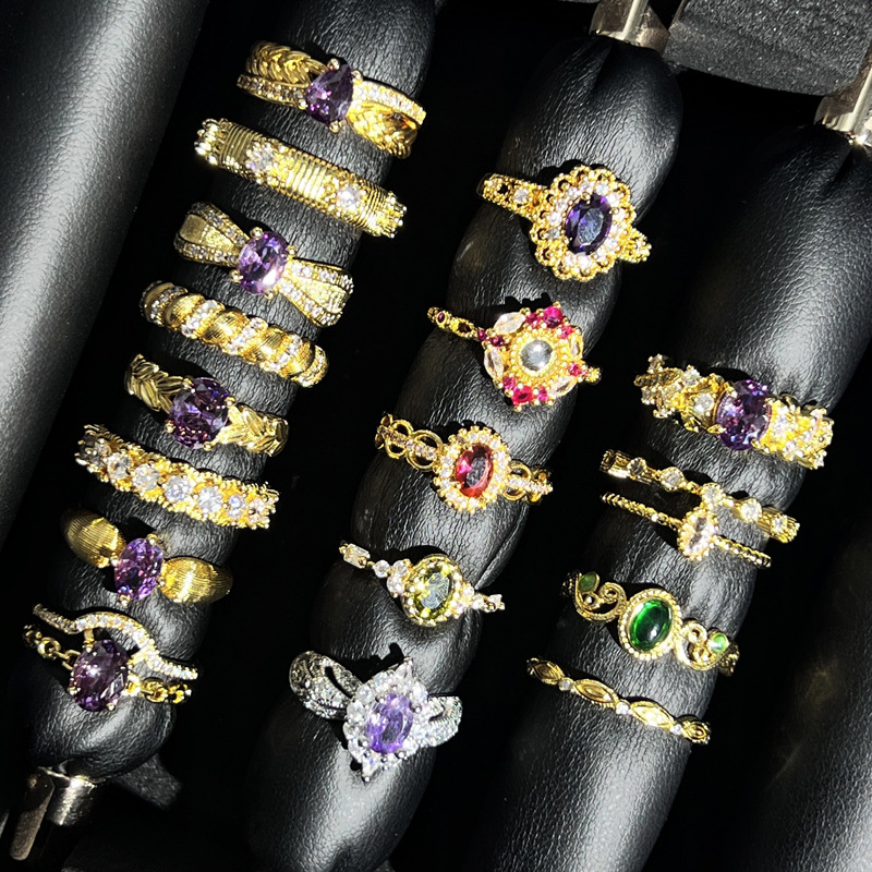 This is a light luxury ring with a golden texture in a Chinese style, the same as grandma's. It features a brushed purple diamond pattern and a high-end, sweet and cool ring style full figure